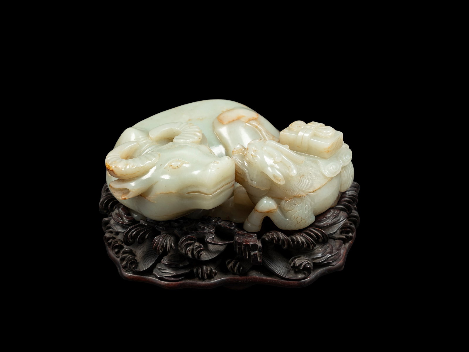 A CELEDON AND RUST JADE GROUP, China, Republic period (1912-1949) (1 of 5)