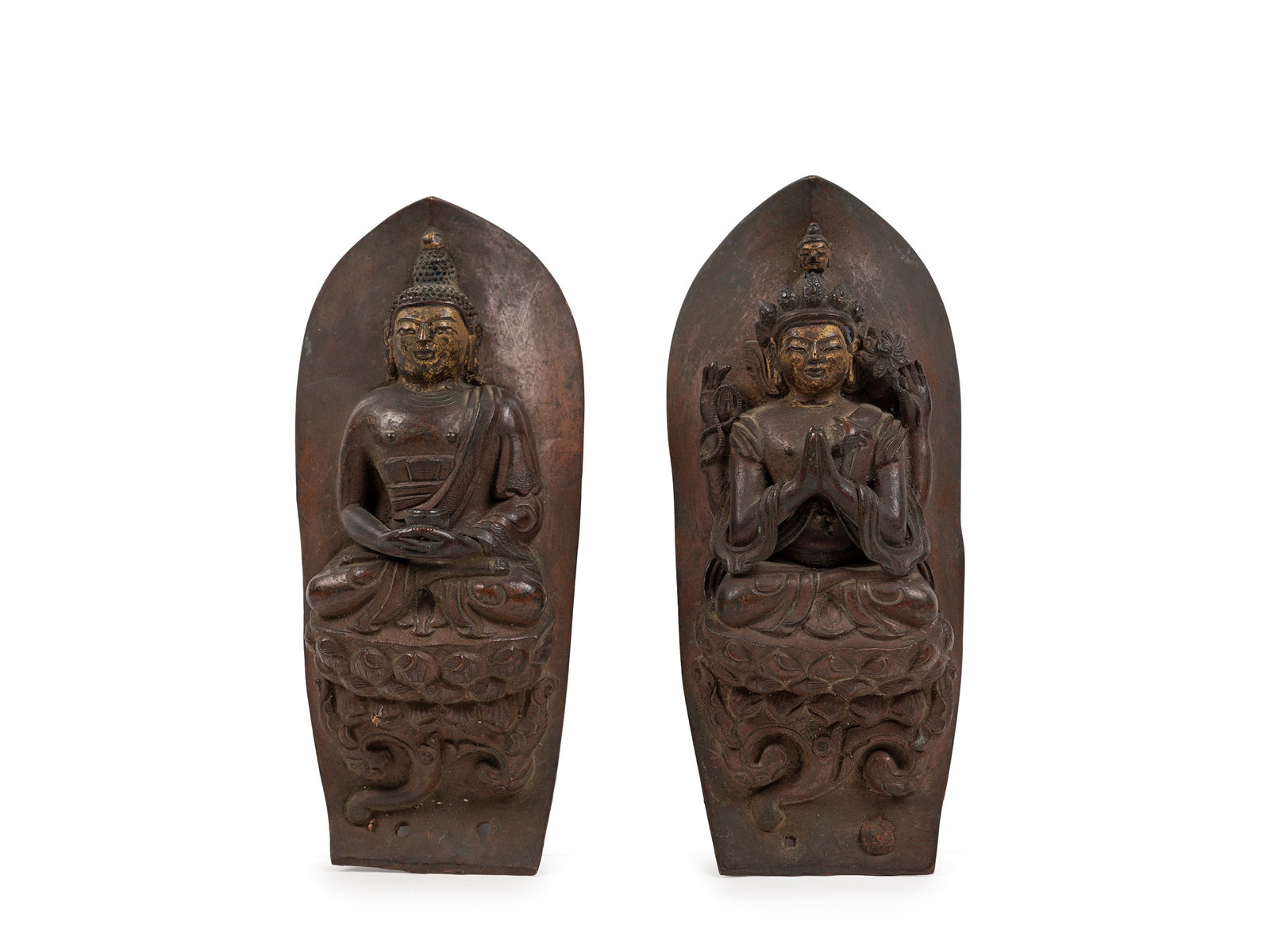 A PAIR OF REPOUSSÉ BRONZE DEITIES, Himalaya, 18th/19th century: h cm 17 Shakyamuni Buddha and Avalokiteshvara seated on a double lotus base, in a meditative posture.喜马拉雅 18/19世纪 藏传佛教