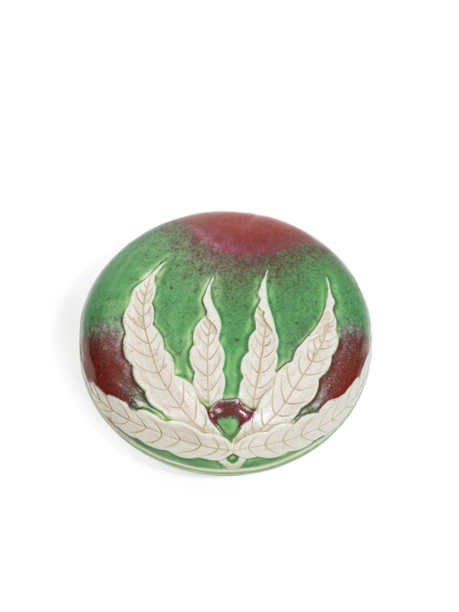 A PORCELAIN INK-STONE, China, Qing dynasty, 19th century: d cm 12 Modelled in the shape of a leafy peach.清19世纪 仿生瓷桃形盖盒