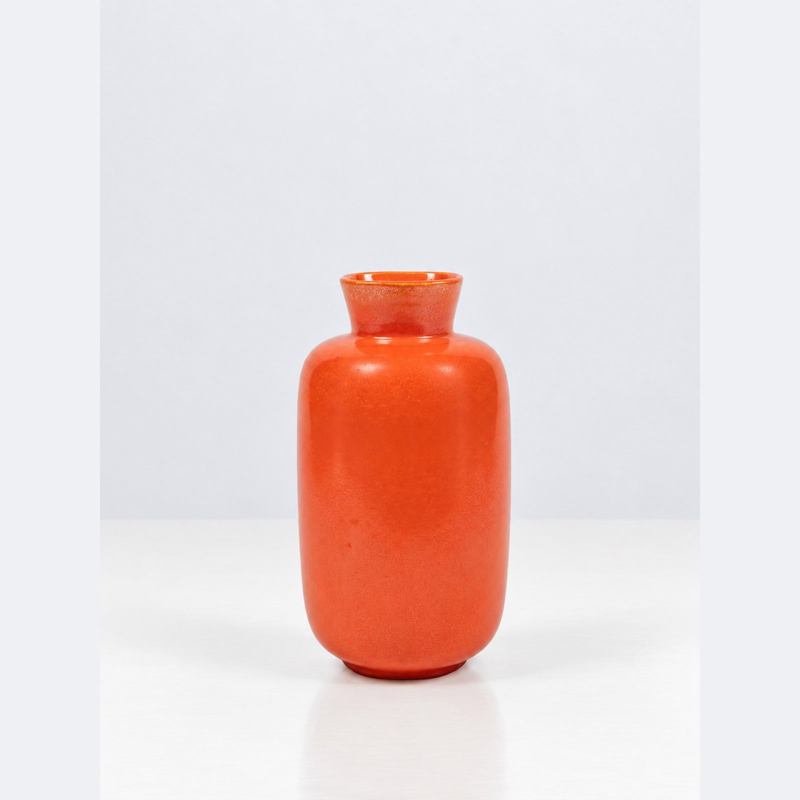 Giovanni Gariboldi (Milano 1908 - 1971), VASE, circa 1940s: h cm 21,5 Orange glazed ceramic. Richard-Ginori mark on the underside. Produced by Richard-Ginori, Italy.Catalogue note:An example of the same model is preserved at the MIDeC – International Museum 