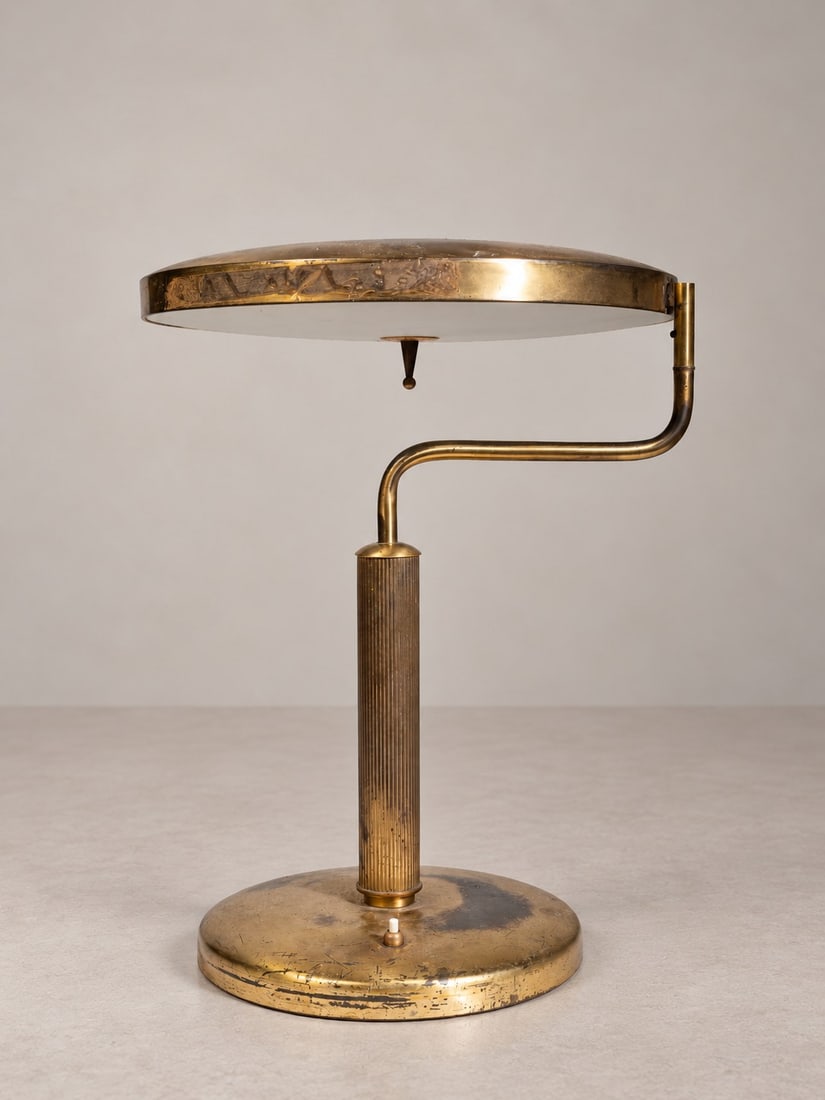 Fontana Arte, TABLE LAMP, circa 1940s: h cm 43 x d cm 36,5 Brass frame with adjustable frosted glass diffuser. Produced by Fontana Arte, Italy.