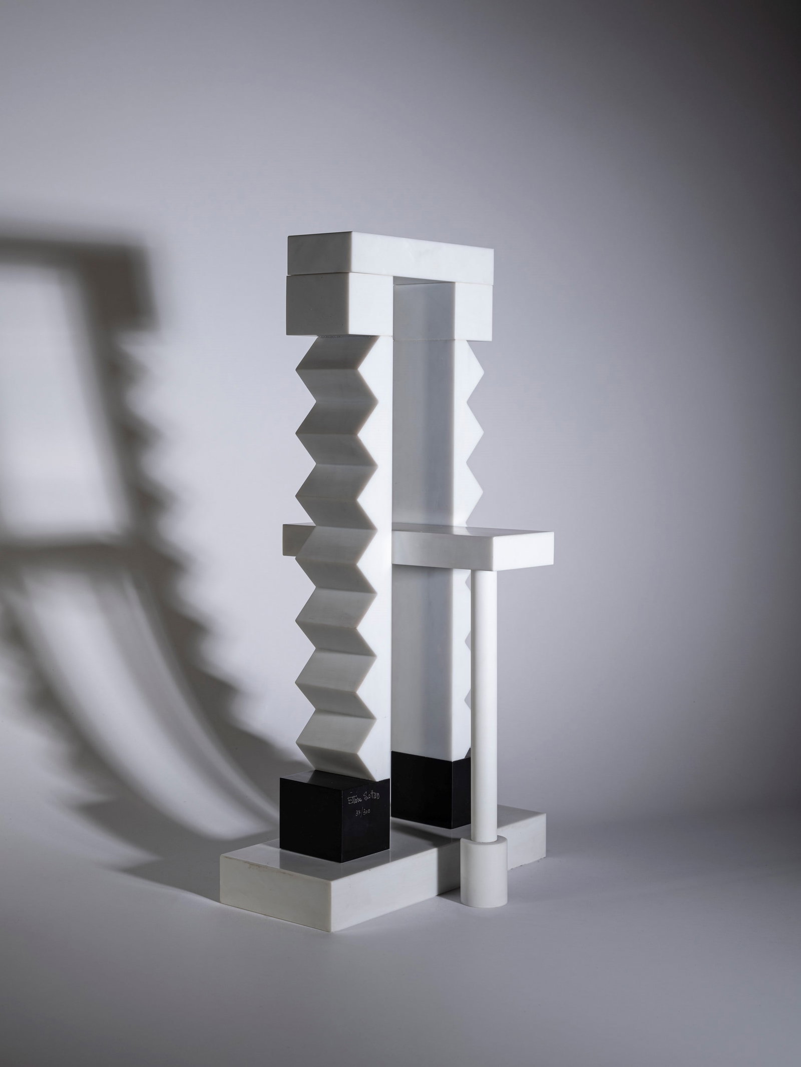 Ettore Sottsass (Innsbruck 1917 - 2007), SMALL PERLIONE , 1989: h 52 x l 22 x w 28 cm White P, Belgian Black, for Ultima Edizione, limited edition of 300, item no. 37 of 300.Accompanied by a certificate of authenticity from Ultima Edizione.