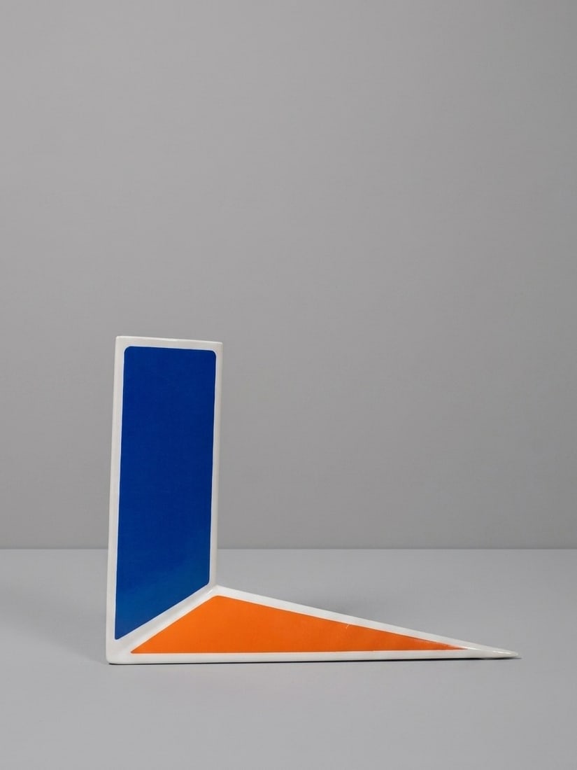 Alessandro Mendini (Milano 1931 - 2019), "A PUNTA" VASE / HUMIDIFIER, circa 1990s: h cm 22 x l cm 28 x w cm 8 Glazed ceramic decorated with polychrome geometric patterns. Author's signature and manufacturer's mark, Il Coccio, Milan, Italy.