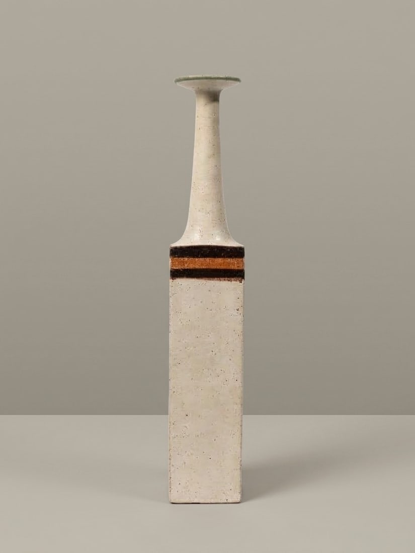 Bruno Gambone (Vietri sul Mare 1936 - 2021), VASE, circa 1970s: h cm 47,5 x l cm 8 x w cm 6,5 Glazed stoneware with a square cross-section and a tall bottle neck. Signature on the base. Made in Italy.
