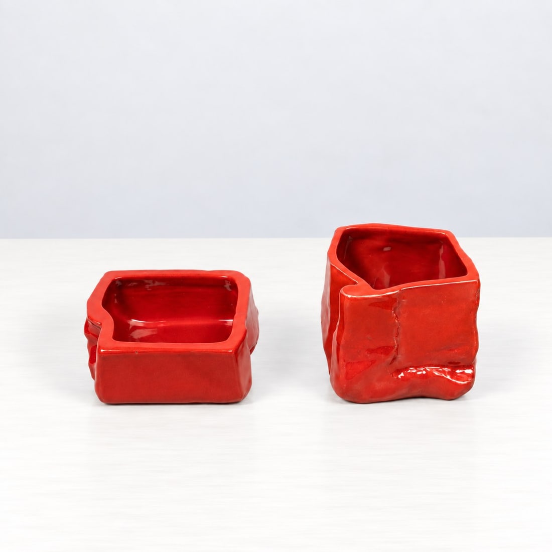 Franco Meneguzzo (Valdagno 1924 - 2008), BOWLS, 1956: l max cm 7,5 x w max cm 7 x h max cm 6 Set of two. Glazed earthenware, Laboratorio Danese; the manufacturer’s mark, ‘Meneguzzo’, and an initials are stamped on the reverse.Catalogue notes:See th