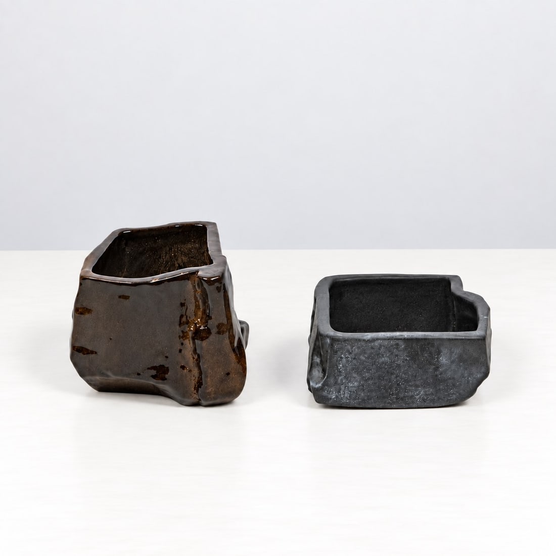 Franco Meneguzzo (Valdagno 1924 - 2008), BOWLS, 1956: l max cm 7,5 x w max cm 7 x h max cm 6 Set of two. Glazed earthenware, Laboratorio Danese; the manufacturer’s mark, ‘Meneguzzo’, and an initials are stamped on the reverse.Catalogue notes:See th