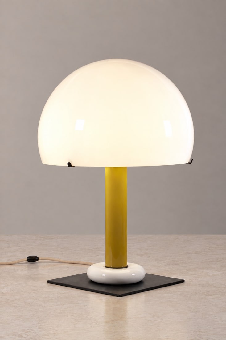 VENINI, MODEL 844 TABLE LAMP, 1982: h cm 60 x d cm 40 Opaline glass, colored glass and painted metal. Signed and dated. Produced by Venini, Murano, Italy.