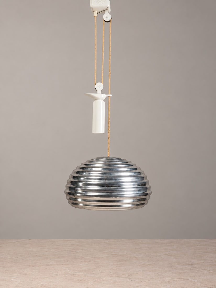 Achille & Pier Giacomo Castiglioni, SPLÜGEN PENDANT LAMP, circa 1960s: h max cm 180 x d cm 40 Spun and polished aluminum shade with counterweight height-adjustment system. Produced by Flos, Italy.