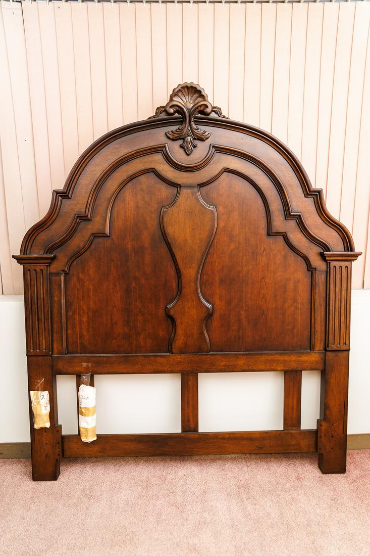 Century Furniture LLC Queen Headboard: Queen headboard made by Century. The headboard appears in excellent used condition. There are metal rails and legs, but no sideboards or footboard present.