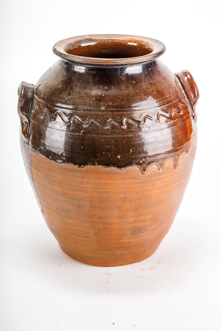 Turtle Creek Pottery- David T. Smith -Tall Pottery Vase: David T. Smith tall redware jug/vase. Chips noted on handles that appear intentional for the design. Marked and signed on bottom, original price tag is present for $125.