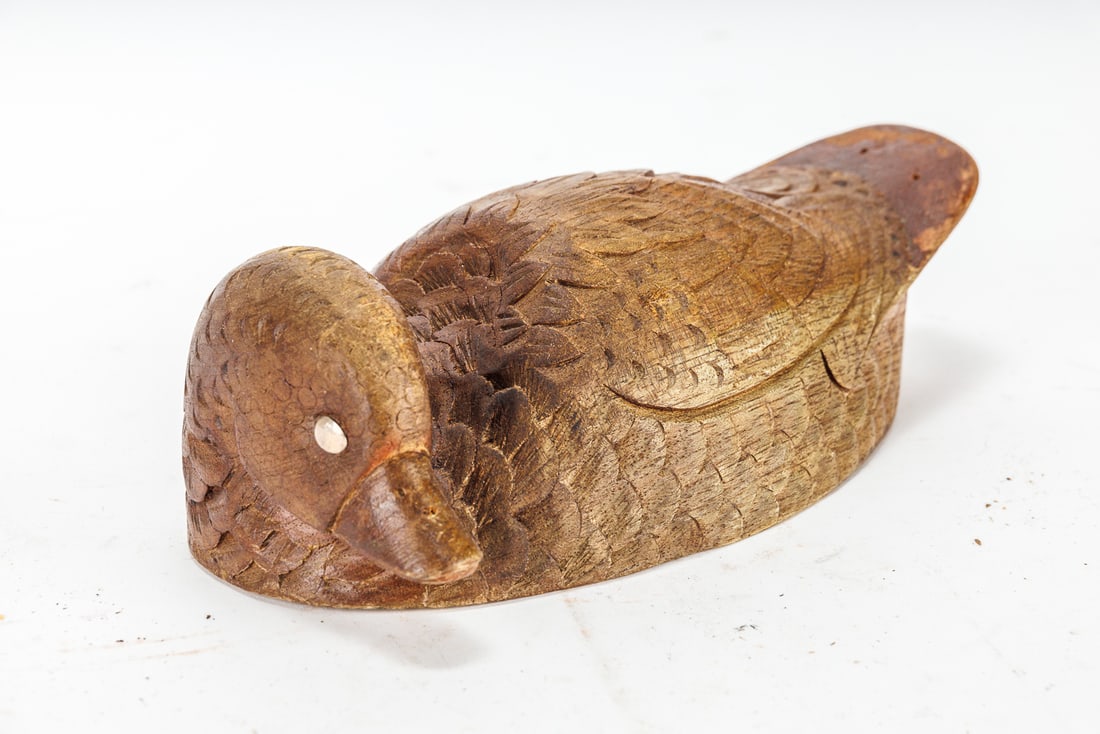 Wooden Duck from Ecuador: Vintage carved wooden duck with turned head. Flat, marked on bottom Quito- Ecuador. Wear to finish consistent with age. See photos for details.