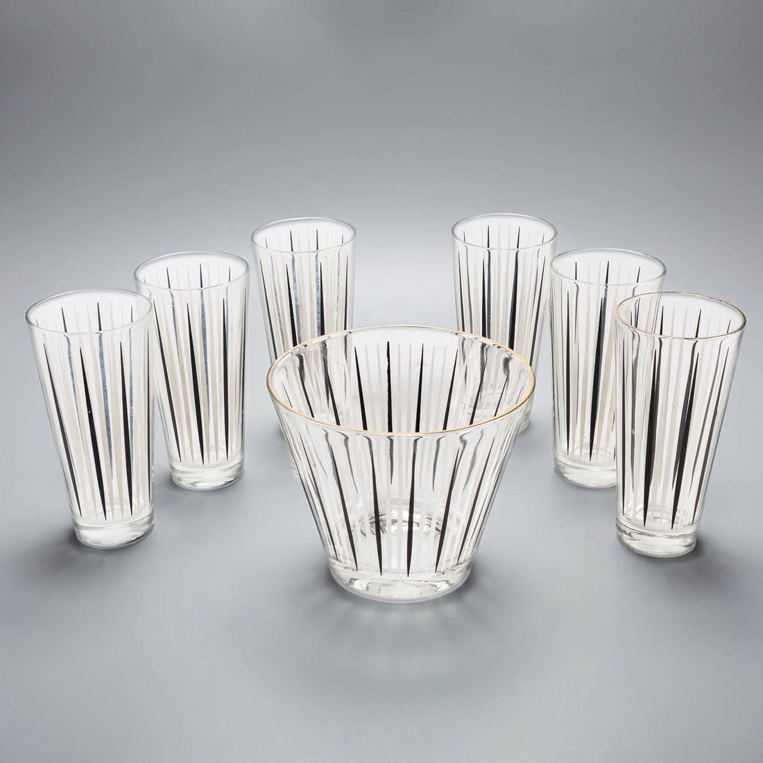 Set of Vintage Hazel Atlas MCM Glass Ice Bucket & 6 Highball Glasses: Set of vintage Hazel Atlas MCM glass ice bucket & 6 highball glasses.? Featuring black and white vertical stripes.? 4 of the 6 glasses have wear from usage, otherwise in good condition. See photos