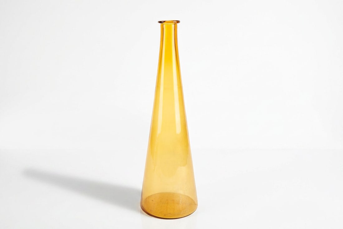 Vintage Empoli Bottle in Amber Glass - Cool!: Dated vintage, this bottle showcases a beautiful, blown amber glass and is attributed to the famed Empoli region of Tuscany, Italy. Empoli glass was noted for its colorful decanters and textured