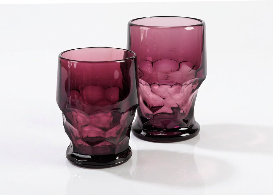 Pair of Vintage Viking Glass Georgian Tumblers in Amethyst: A pair of vintage Viking Glass amethyst Georgian tumblers.? Gorgeous color featuring the honeycomb pattern.? A larger one and smaller one by its side.? Smaller piece has some wear from age, otherwise