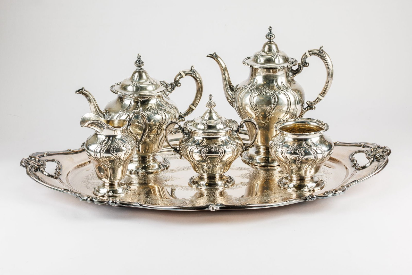 Gorham Sterling Silver Chantilly Duchess Tea and Coffee Hollowware Service: Gorham's Chantilly is arguably the most desired of all sterling silver patterns. This set features Rococo scrolls and floral accents of the original Chantilly pattern adapted specifically for hollowwa