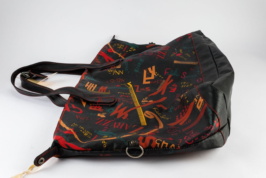 Vintage Falchi Sport Large Duffel Bag: Vintage Falchi Sport, PVC with a leather bottom, alphabet print duffel bag with interior organizational pockets.