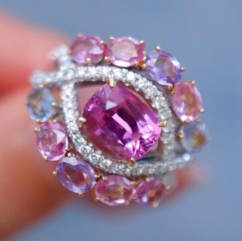 1.25ct Natural Sapphire 18Kt Gold Ring: 18Kt gold inlaid with 1.25ct natural pink sapphire and 0.43cts South African natural diamonds, accessory stone: 10 natural pink sapphires. Gorgeous design, attractive style, bright color, clean-crysta