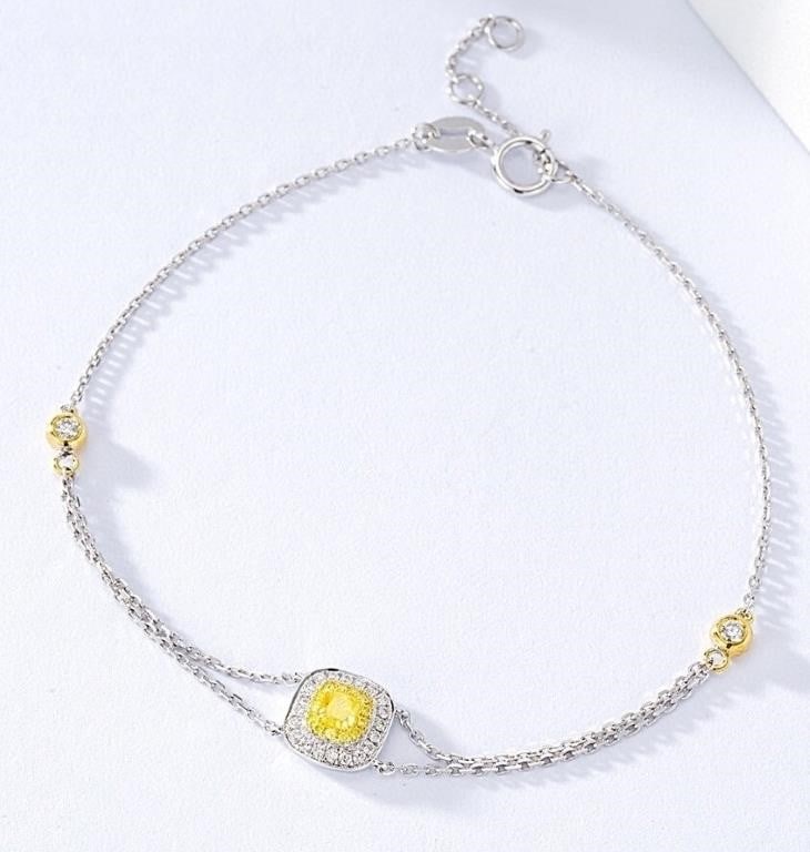 Natural Yellow Diamond 18Kt Gold Bracelet: 18Kt gold set with 0.12ct natural yellow diamond, matched with 0.18cts natural diamonds. Bright color, shining and dazzling, good clarity. Shape: Cushion-shaped. Cut: Excellent. Internationally certif