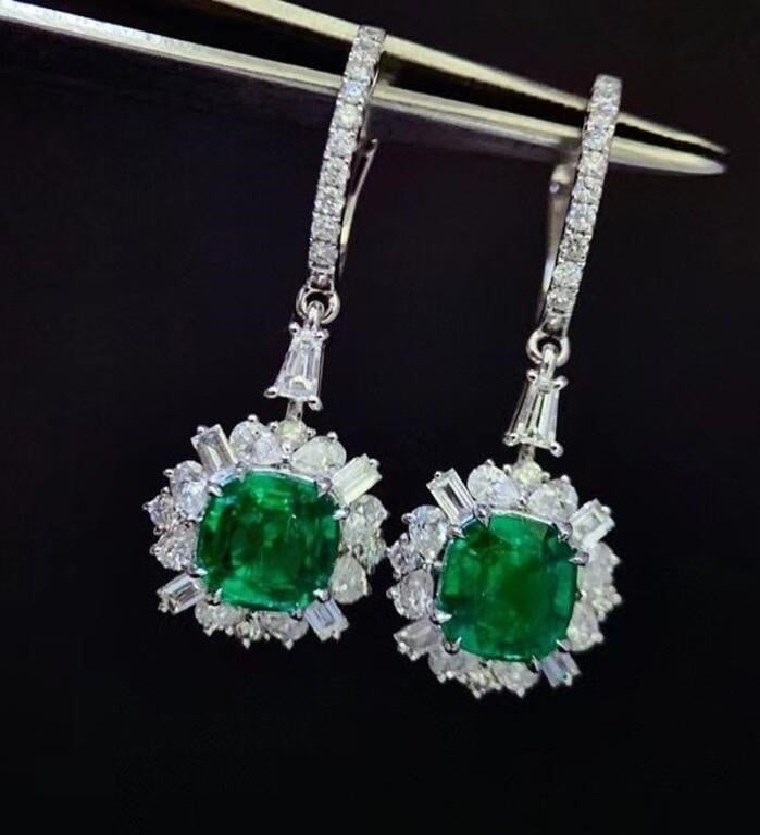 2.6cts Zambian Emerald 18Kt Gold Earrings: 18Kt gold deluxe set with 2.62cts Zambian natural emeralds and 1.34cts natural South African high quality diamonds. The colors are bright, clean-crystal, superb texture. Overall condition is excellent