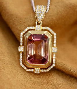 3.2ct Natural Tourmaline 18Kt Gold Pendant: 18Kt gold deluxe set with 3.2ct natural tourmaline and 0.2cts natural diamonds. Gorgeous design, attractive style, rich color, clean crystal, good clarity. Shape: Octagonal-shaped. Cut: Excellent.