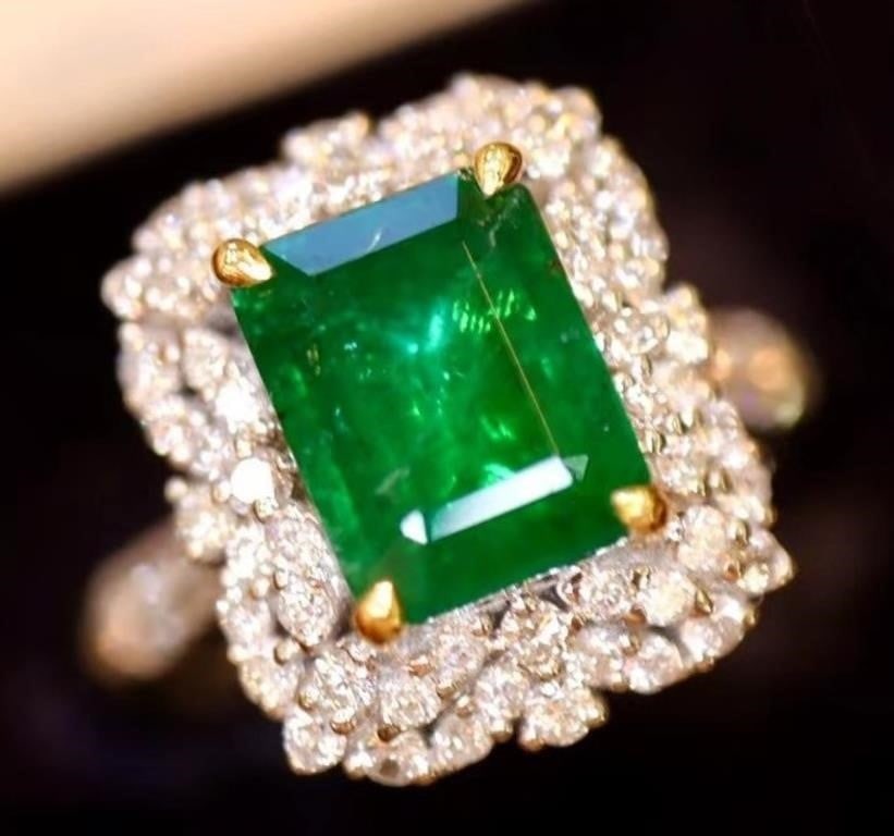 2.8ct Natural Eemerald Ring 18K Gold: 18K gold inlaid with 2.8ct emerald and 1.02ct diamond, stunning in tone and brightness, superb texture. Excellent cut. International certified natural emerald with the international authority certific