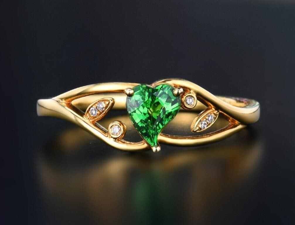 Natural Tsavorite 18Kt Gold Ring: 18Kt gold set with 0.5ct natural tsavorite and natural diamonds, this one is stunning in terms of color and brightness, superb texture. Internationally certified natural Tsavorite, comes with Internat