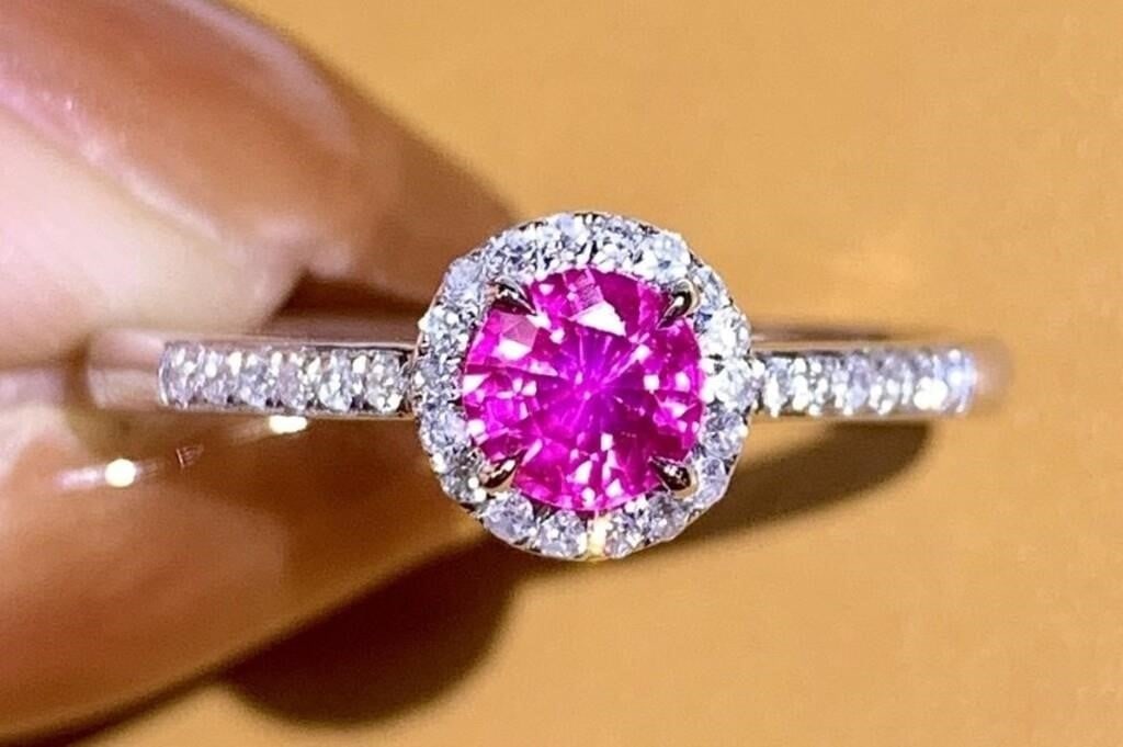 Natural Sapphire 18Kt Gold Ring: 18Kt gold luxury inlaid 0.45ct natural pink sapphire and 0.16cts natural South African diamonds, bright color, clean-crystal, good clarity. Shape: Round. Cut: Excellent. Internationally certified natu