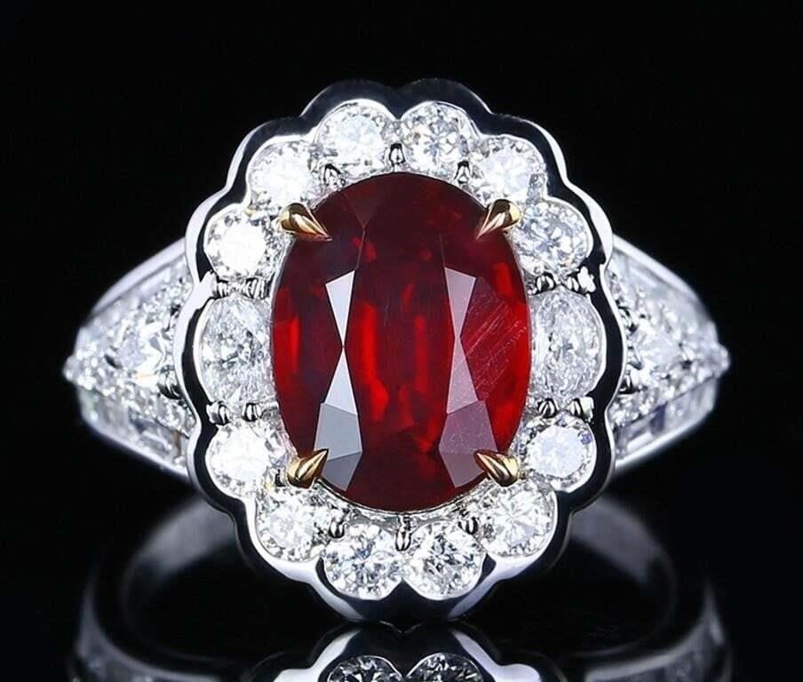 3ct Pigeon Blood Ruby 18K Gold Ring: 18K gold luxury set with 3ct natural pigeon blood ruby and 1.6cts South African natural diamonds, bright color, clean-crystal, shining and dazzling. Shape: Oval. Cut: Excellent. Internationally certif