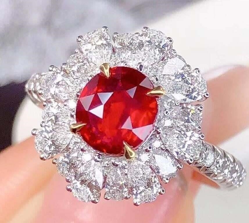 2ct Pigeon Blood Ruby 18K Gold Ring: Main stone: 2ct natural pigeon blood ruby, 18K gold luxury set 1.8cts natural high quality diamonds, crystal clear, full color, rich color. Shape: Oval. Excellent cut. Internationally certified natura