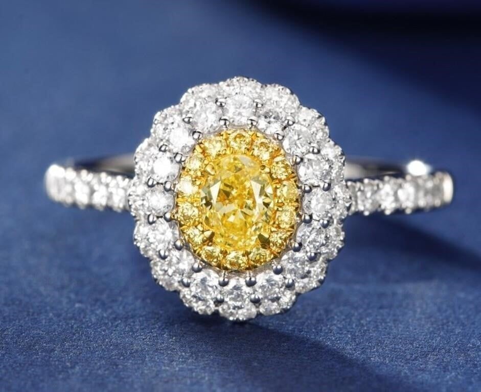 Natural Yellow Diamond 18K Gold Ring: 18K gold set with 0.3ct natural yellow diamond, matched with 0.54cts natural diamonds. Bright color, shining and dazzling, good clarity. Shape: Oval. Cut: Excellent. Internationally certified natural 