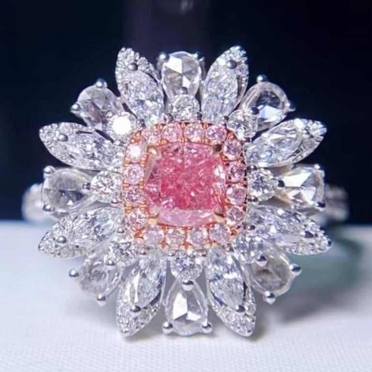 Natural Pink Diamond 18K Gold Ring: 18K gold inlaid natural high quality diamonds, main stone: 0.4ct pink diamond, accessory stone: 1.05cts natural South African white diamonds. Gorgeous design, attractive style, inlaid with pink diamon