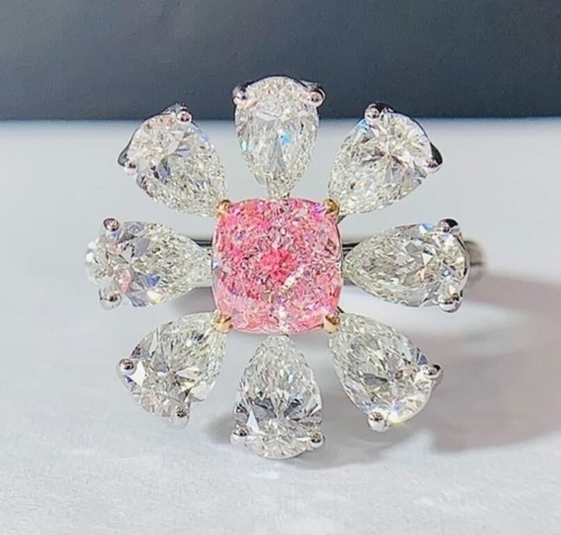 1ct Natural Pink Diamond 18K Gold Ring: 18K gold inlaid natural high quality diamonds, main stone: 1ct pink diamond, accessory stone: 8 natural South African high-quality white diamonds. Gorgeous design, attractive style, inlaid with pink d