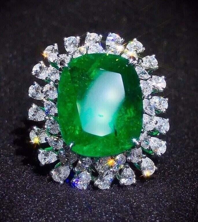 12.6ct Zambian Emerald 18K Gold Ring: Handcrafted from heavy gold, very lavish and splendid. 18K gold deluxe set with 12.6ct Zambian natural emerald and 2.7cts natural South African diamonds. Crystal-clear, clean and transparent, emerald