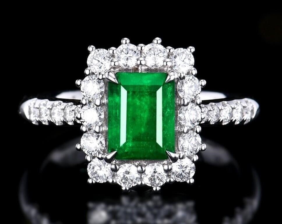 1.5ct Colombian Emerald 18K Gold Ring: 18K gold deluxe set with 1.5ct Colombian natural emerald and 0.75cts South African natural diamonds, bright colors, crystal-clean, shining and dazzling. Shape: Emerald-cut. Cut: Excellent.