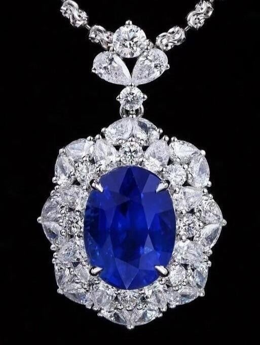 5.4ct Sri Lankan Sapphire 18K Gold Pendant: 18K gold luxury inlaid with 5.4ct Sri Lankan natural royal blue sapphire and 2.6cts natural South African high quality diamonds, bright color, clean-crystal, good clarity. Cut: Excellent.