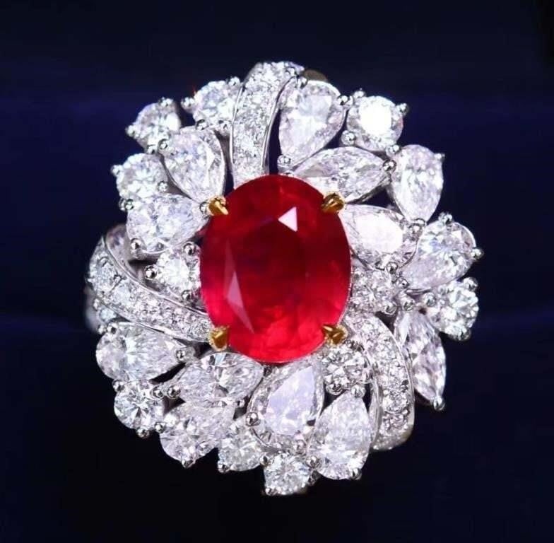3.85ct Natural Ruby Ring 18K Gold: 18K gold luxury inlaid 3.85ct natural ruby and 3.2cts natural South African diamonds, bright color, clean-crystal, good clarity. Shape: Oval. Cut: Excellent. Internationally certified natural Ruby, co