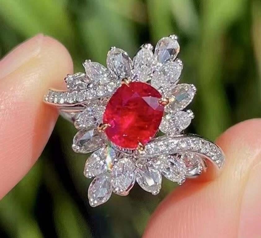1.2ct Pigeon Blood Ruby Ring 18K Gold: 18K gold luxury set with 1.2ct natural pigeon blood ruby and 1.25cts natural South African high-quality diamonds, bright color, clean-crystal, good clarity. Shape: Oval. Cut: Excellent. Internationall