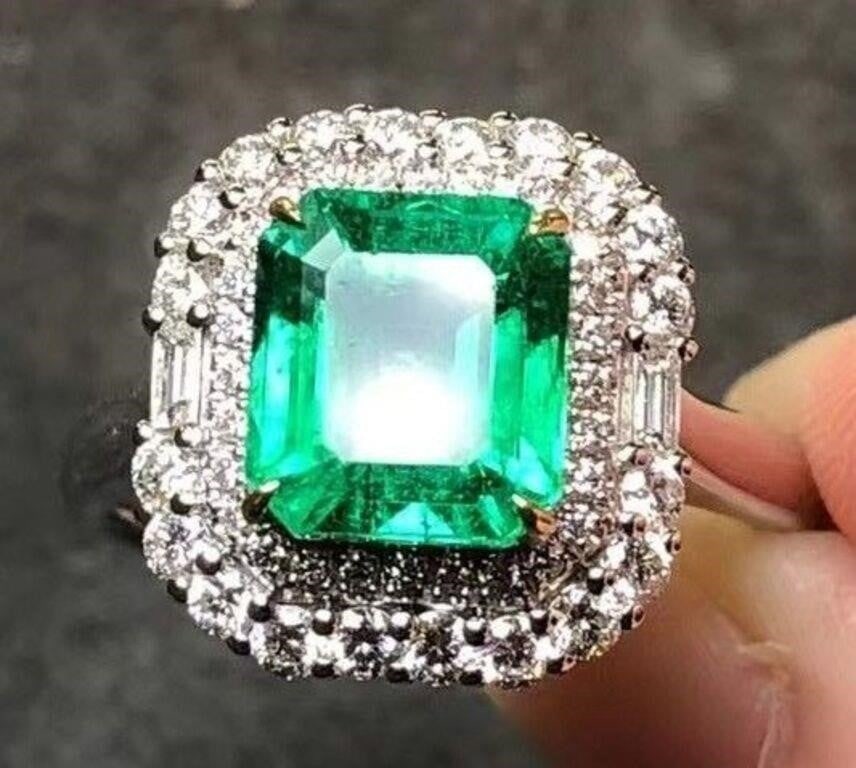 2.5ct Natural Emerald Ring 18K Gold: 18K gold inlaid with 2.5ct Colombian emerald and 0.75cts South African diamonds. Clean and transparent, emerald green, standard cut. Internationally certified natural emeralds. Possess an internationa