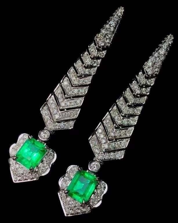 1.2ct Afghanistan Emerald Earrings 18K Gold: 18K gold deluxe set with 1.2cts Afghanistan natural emeralds and natural South African diamonds. The colors are bright. Crystal-clean and good clear. Shape: Emerald-cut. Cut: Excellent. Internationall
