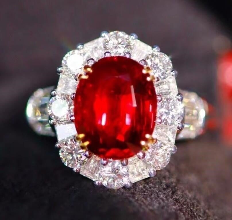 3.6ct Pigeon Blood Ruby 18K Gold Ring: 18K gold luxury set with 3.6ct natural pigeon blood ruby and natural South African high-quality diamonds, bright color, clean-crystal, good clarity. Shape: Oval. Cut: Excellent. Internationally certif