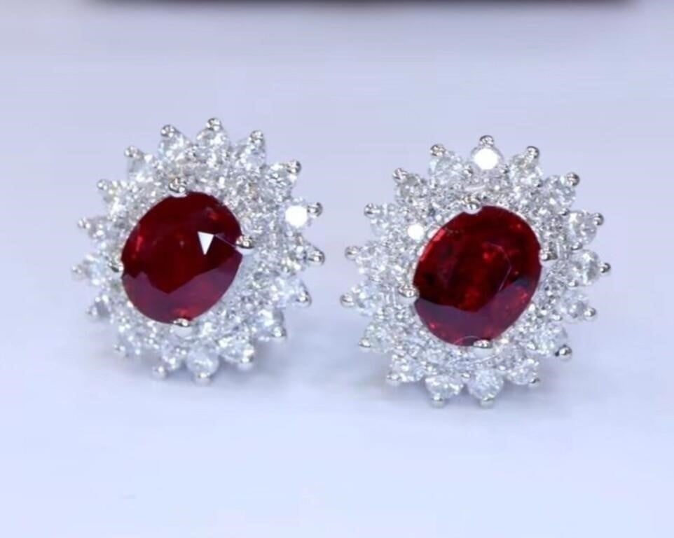 1ct Pigeon Blood Ruby 18K Gold Earrings: 18K gold luxury set with 1cts natural pigeon blood rubies and 0.5cts natural South African diamonds, bright color, clean-crystal, shining and dazzling. Shape: Oval. Cut: Excellent. Internationally cer