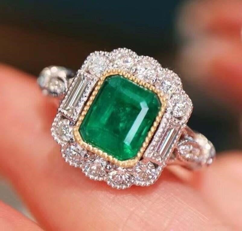 1.1ct Natural Emerald 18K Gold Ring: 18K gold deluxe set with 1.1ct natural emerald and 0.6cts natural South African high-quality diamonds, bright colors, crystal-clean, shining and dazzling. Shape: Emerald-cut. Cut: Excellent. Internati