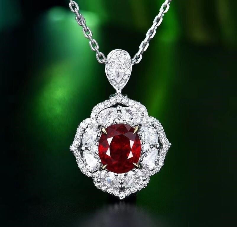 2.1ct Natural Pigeon Blood Ruby Pendant 18K Gold: 18K gold inlaid with 2.1ct natural pigeon blood ruby and 1.3cts natural South African high-quality diamonds. Crystal-clear, rich in color, good clarity, bright fire color. Standard cutting.