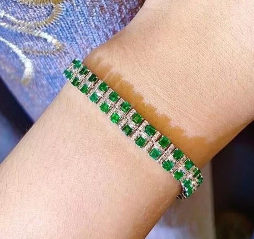 5.7ct Natural Emerald Bracelet 18K Gold: 18K gold inlaid with 5.7cts natural emeralds and natural diamonds. Crystal-clear, gorgeous color and lustre. Full of fire color. Standard cutting. International certified natural emerald, with