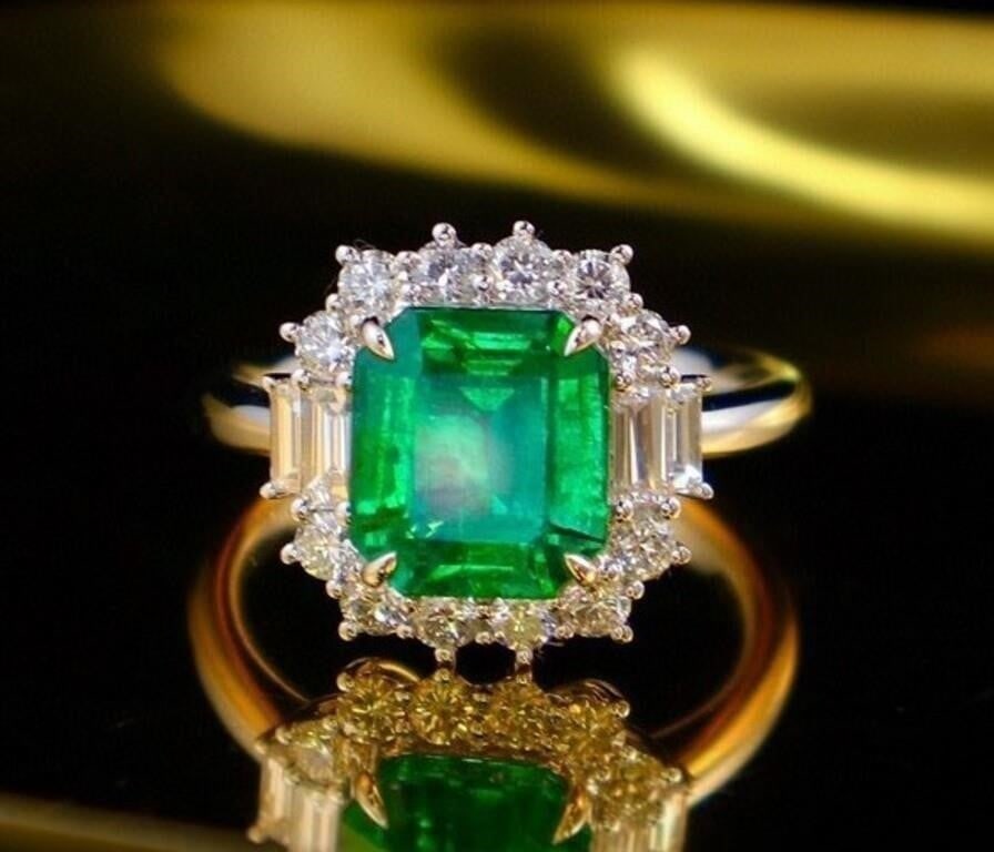 2.8ct Natural Emerald 18K Gold Ring: 18K gold set with 2.8ct natural emerald and 0.9cts natural South African high-quality diamonds, this one is stunning in terms of color and brightness, superb texture. Excellent cut. Internationally