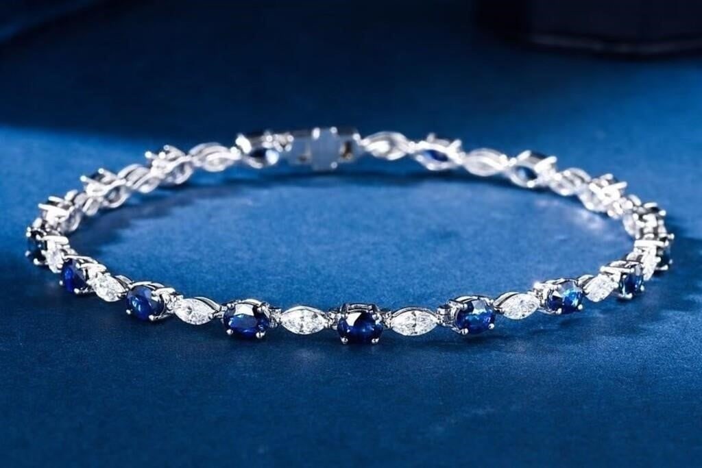 3.5ct Royal Blue Sapphire 18K Gold Bracelet: 18K gold set with 3.5cts natural royal blue sapphires and 1.8cts natural South African high-quality diamonds. Crystal-clear, full color, good color, shining and dazzling. Overall condition is