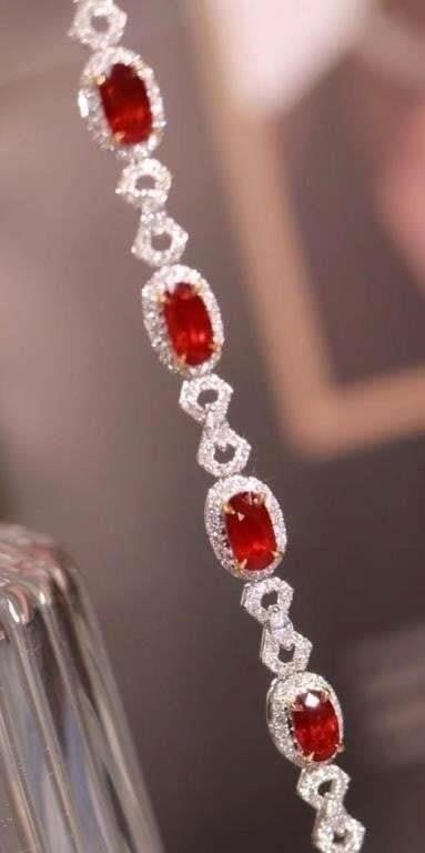 3.4ct Pigeon Blood Ruby 18K Gold Bracelet: 18K gold luxury set with 3.4cts natural pigeon blood rubies and 1.6cts natural South African diamonds, bright color, clean-crystal, shining and dazzling. Gorgeous design, attractive style, extremely g