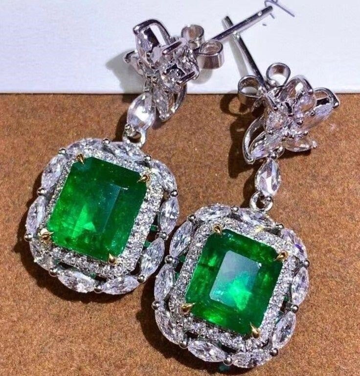 4.7ct Natural Emerald Earrings 18K Gold: 18K gold inlaid with 4.7cts Colombian emeralds and natural diamonds. Crystal-clear, clean and transparent, vivid green. Internationally certified natural emeralds. Possess an international authoritati
