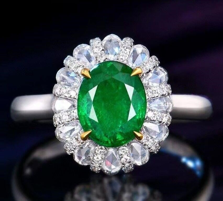 1.7ct Natural Emerald Ring 18K Gold: 18K gold inlaid with 1.7ct Colombian natural emerald and natural high-quality diamonds. Crystal-clear, clean and transparent, vivid green. Internationally certified natural emeralds. Possess an intern