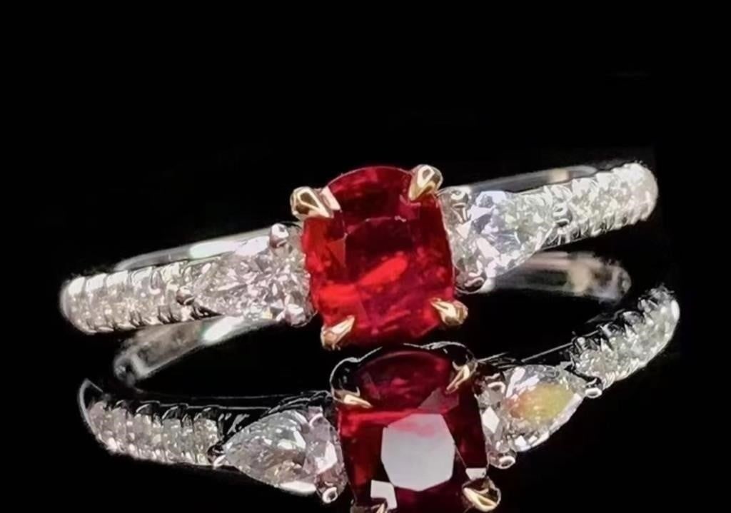 Natural Ruby 18K Gold Ring: 18K gold luxury inlaid 0.6ct natural ruby and natural South African diamonds, bright color, clean-crystal, shining and dazzling. Shape: Oval. Cut: Excellent. Internationally certified natural Ruby, co